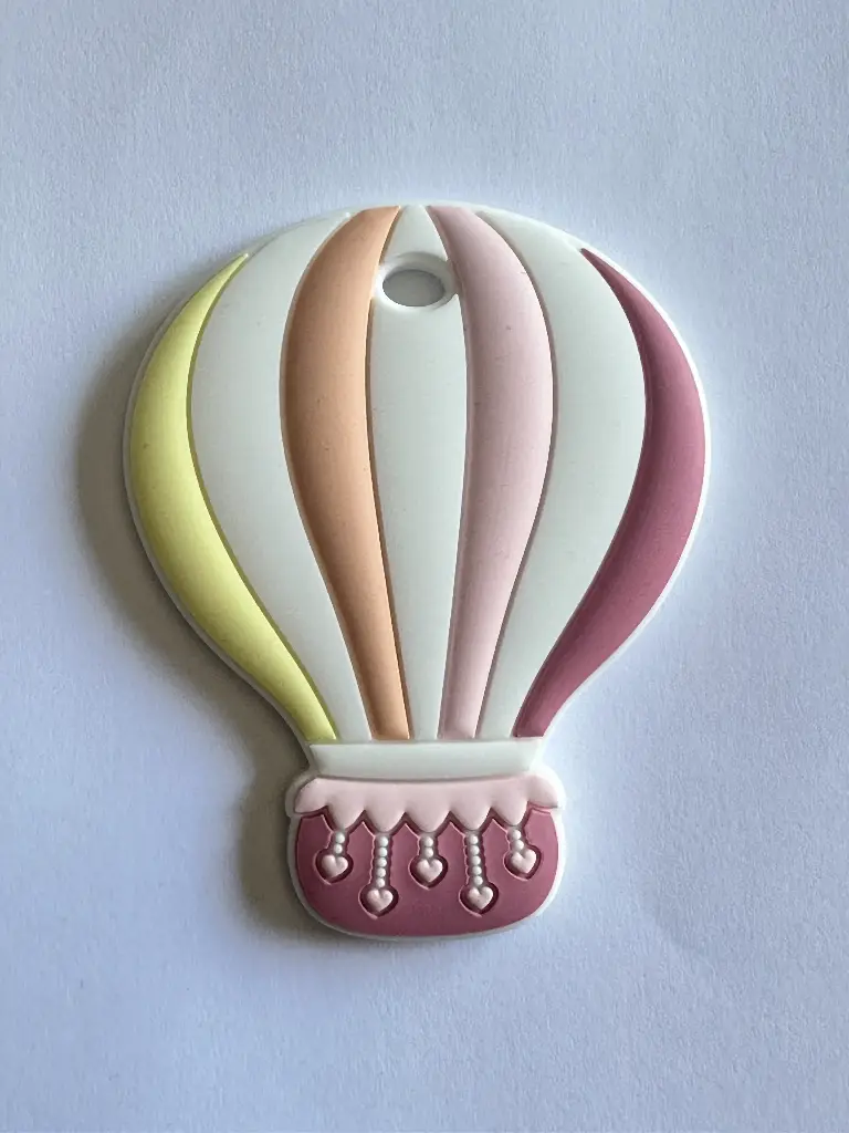 Mordedor Globo pastel